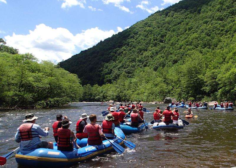 a group of people who are white water rafting along the Lehigh River
